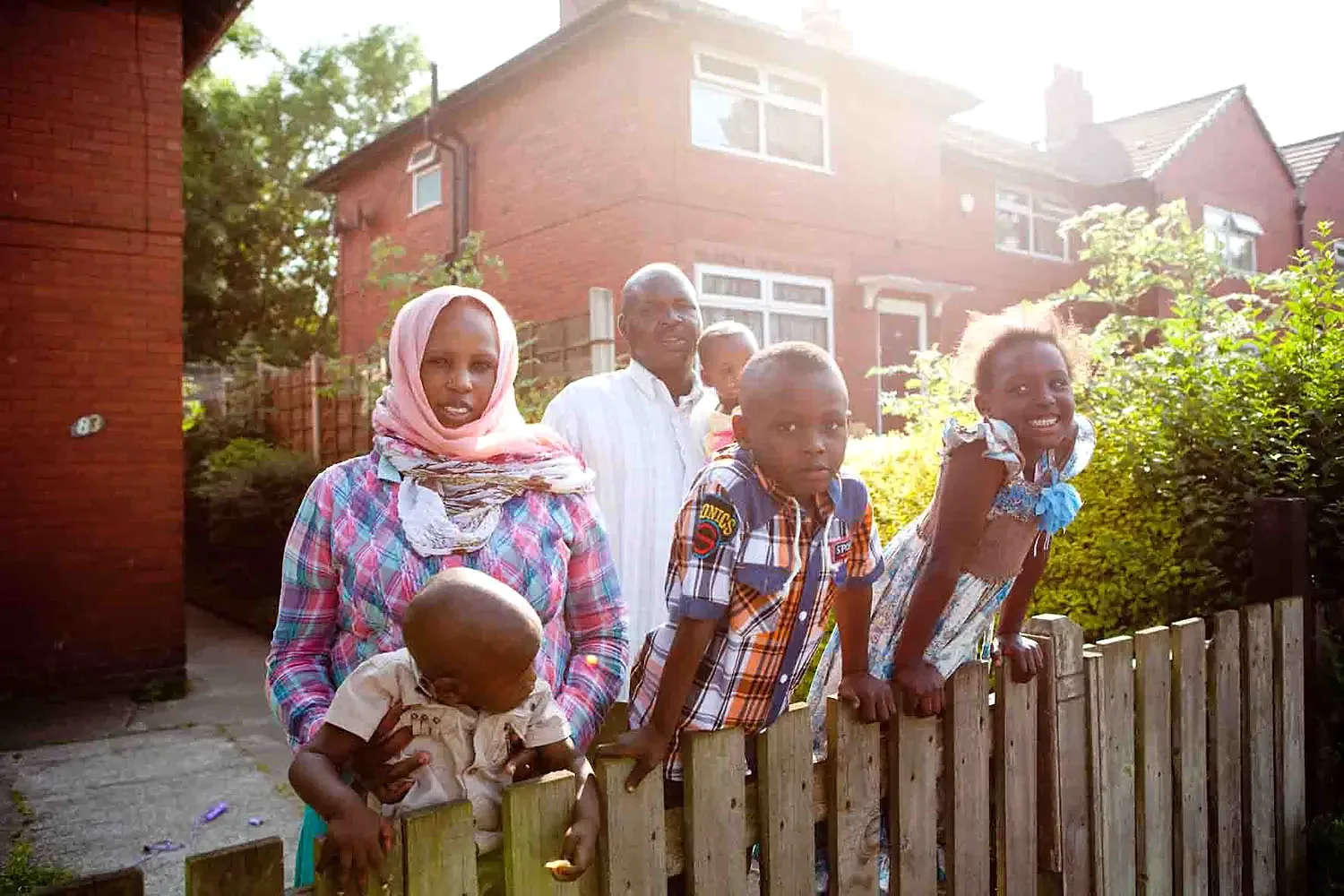 Family in their front garden